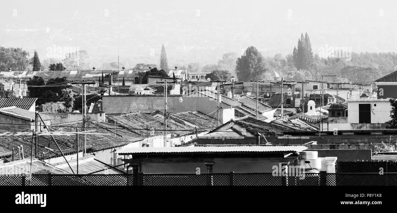 Urban rooftops in the historic town of Antigua, Guatemala, Central America in black and white Stock Photo
