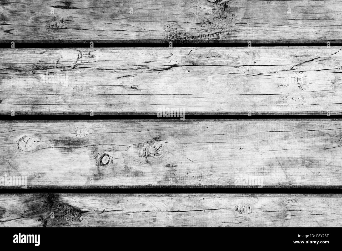 Weathered wooden floorboards background texture in black and white Stock Photo