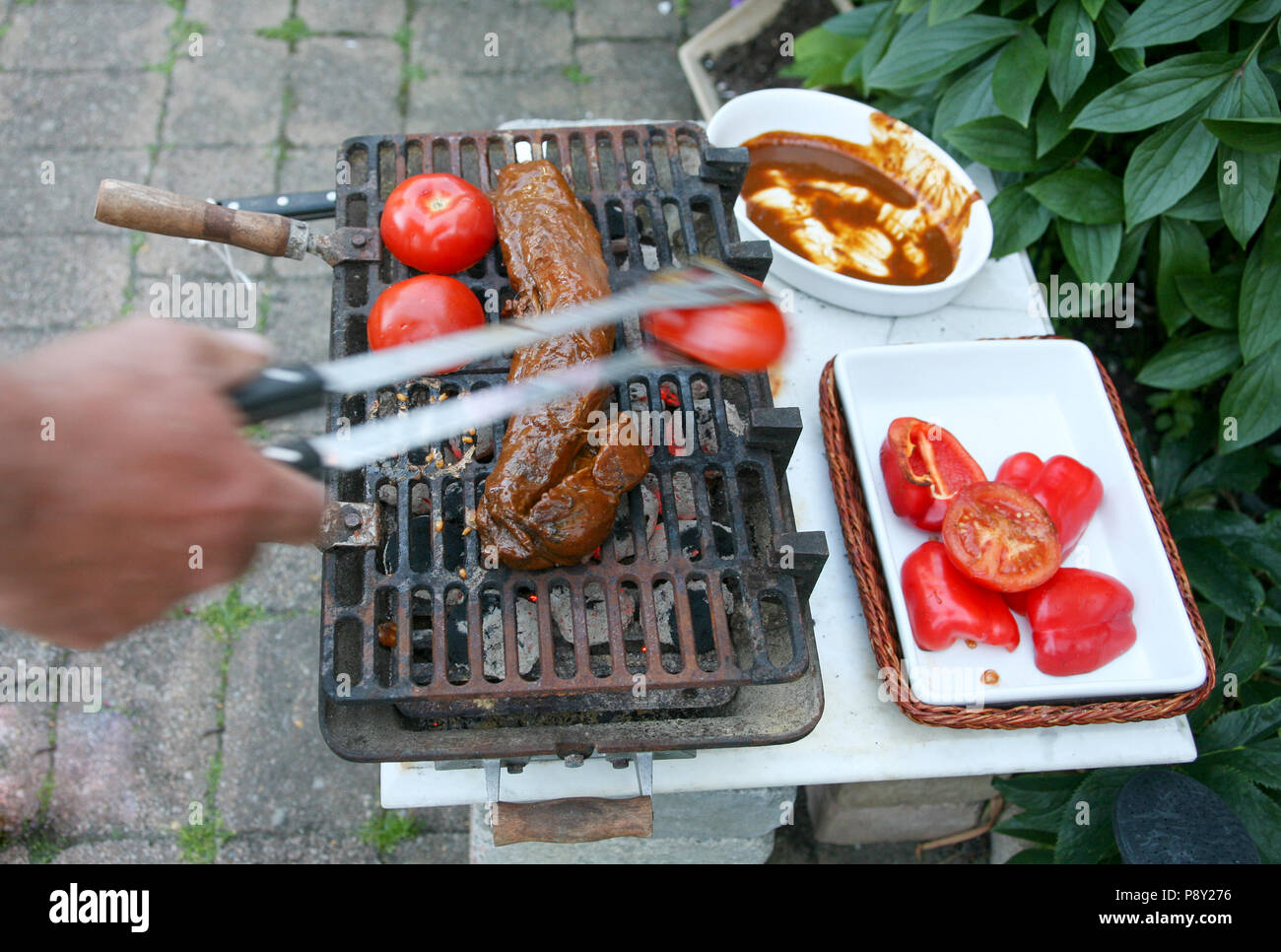 GRILLING out on the backyard 2012 Stock Photo Alamy