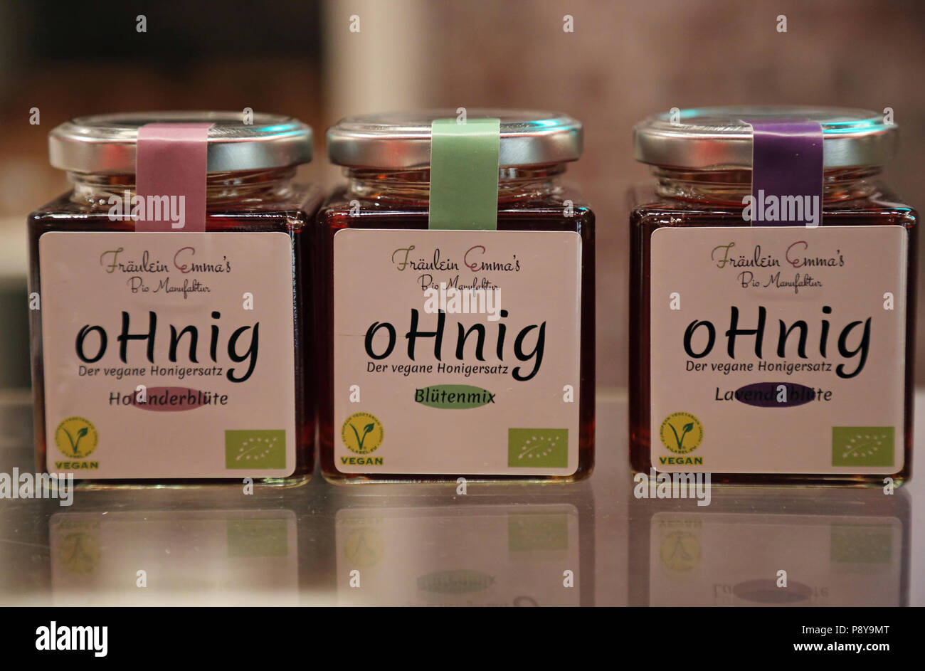 Berlin, Germany, Glaeser with vegan honey substitute Stock Photo