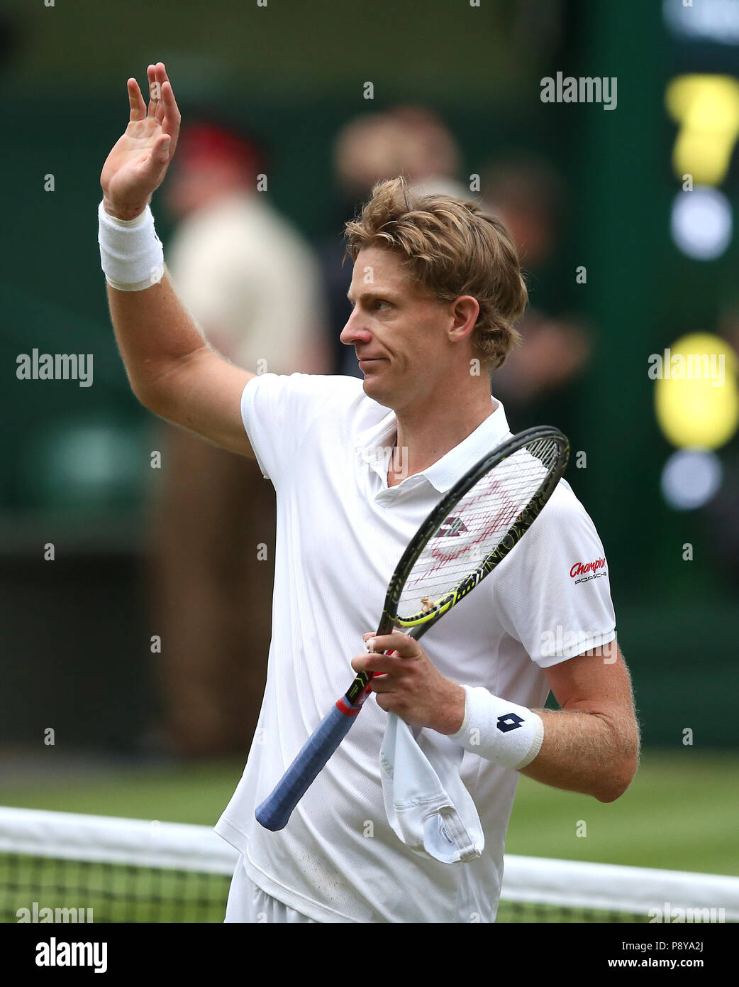 South African eighth seed Kevin Anderson celebrates having reached his first Wimbledon final, beating American ninth seed John Isner 7-6 (8/6) 6-7 (5/7) 6-7 (9/11) 6-4 26-24 in the longest semi-final in the tournamentâ€™s history on day eleven of the Wimbledon Championships at the All England Lawn Tennis and Croquet Club, Wimbledon. PRESS ASSOCIATION Photo. Picture date: Friday July 13, 2018. See PA story TENNIS Wimbledon. Photo credit should read: Steven Paston/PA Wire. RESTRICTIONS: Editorial use only. No commercial use without prior written consent of the AELTC. Still image use only - no mo Stock Photo