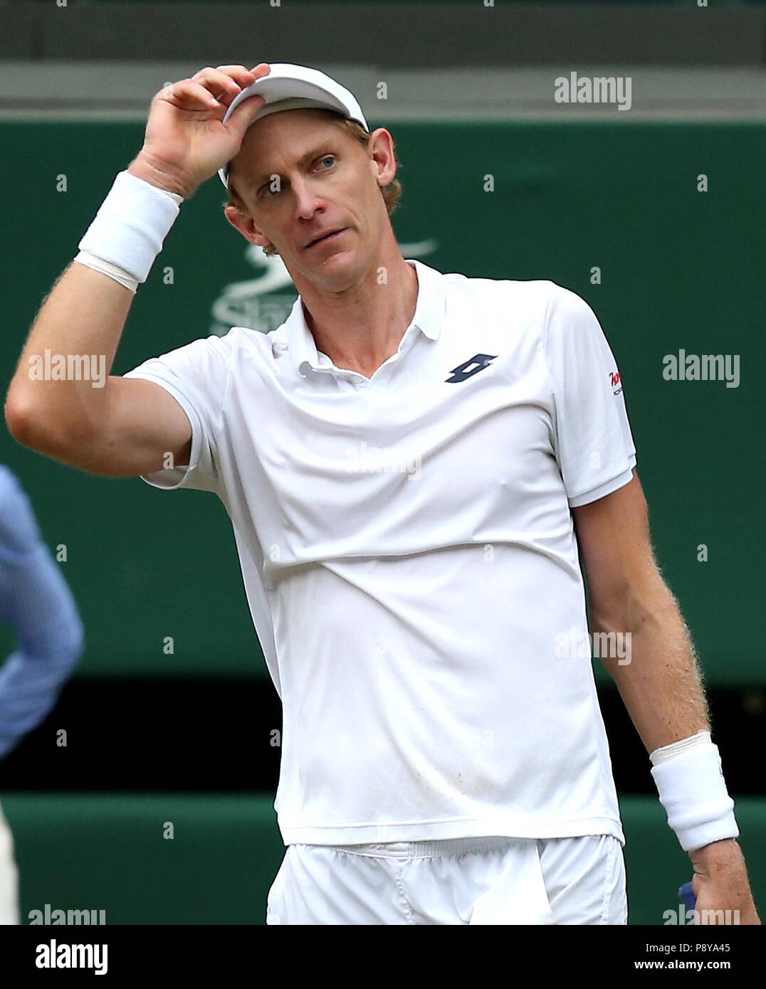 South African eighth seed Kevin Anderson celebrates having reached his first Wimbledon final, beating American ninth seed John Isner 7-6 (8/6) 6-7 (5/7) 6-7 (9/11) 6-4 26-24 in the longest semi-final in the tournament's history on day eleven of the Wimbledon Championships at the All England Lawn tennis and Croquet Club, Wimbledon. PRESS ASSOCIATION Photo. Picture date: Friday July 13, 2018. See PA story tennis Wimbledon. Photo credit should read: Steven Paston/PA Wire. RESTRICTIONS: Editorial use only. No commercial use without prior written consent of the AELTC. Still image use only - no mo Stock Photo