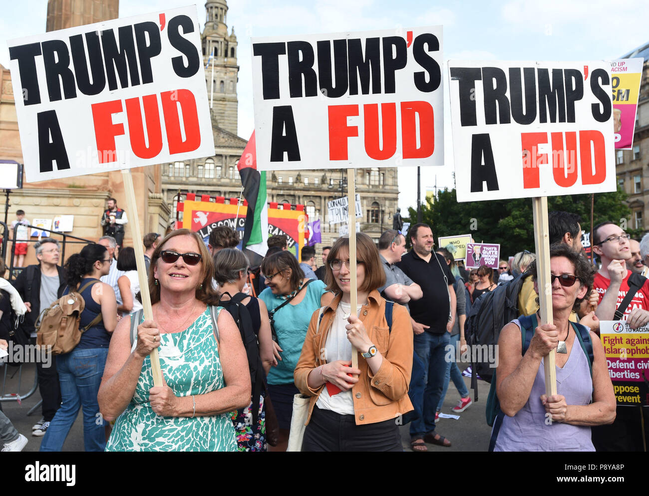 Demonstrators in George Square, Glasgow, for the Scotland United Against Trump protest against the visit of US President Donald Trump to the UK. Stock Photo