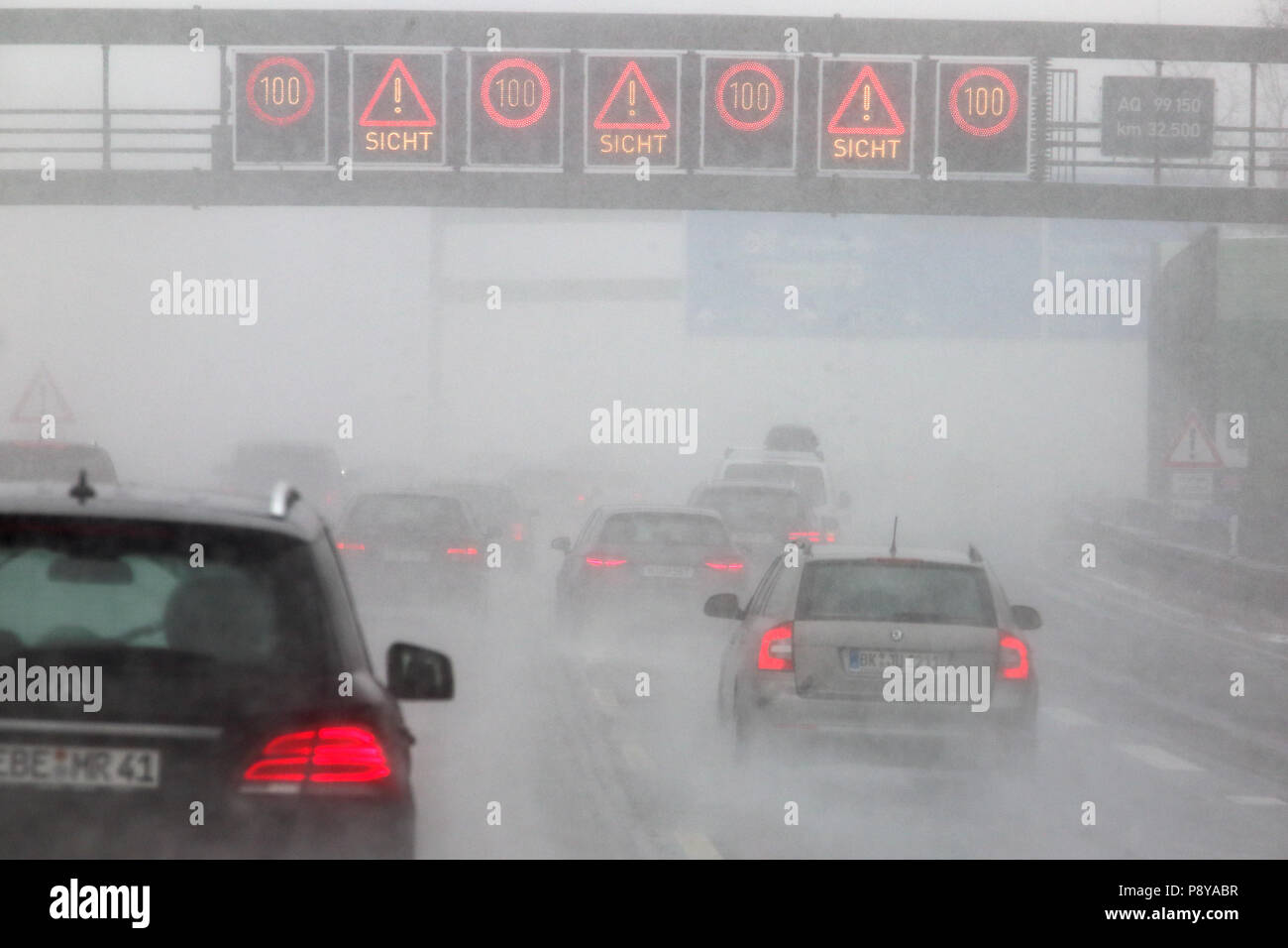Munich, Germany, bad view on the A8 motorway in snowfall Stock Photo