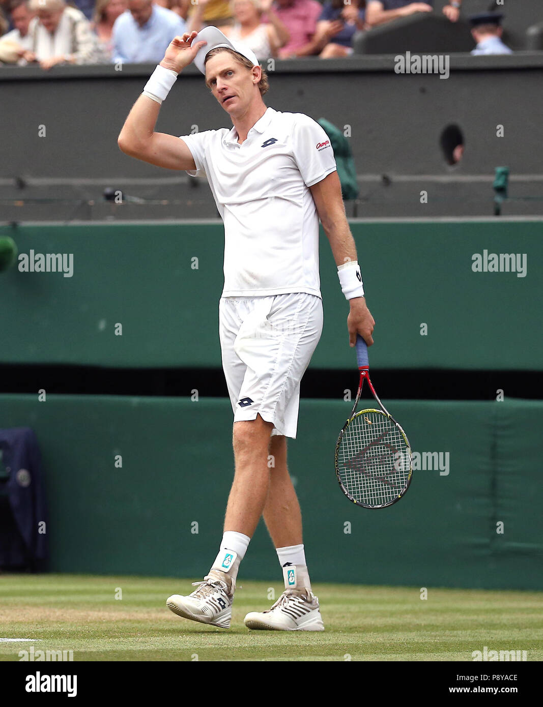 South African eighth seed Kevin Anderson celebrates having reached his first Wimbledon final, beating American ninth seed John Isner 7-6 (8/6) 6-7 (5/7) 6-7 (9/11) 6-4 26-24 in the longest semi-final in the tournament's history on day eleven of the Wimbledon Championships at the All England Lawn tennis and Croquet Club, Wimbledon. Stock Photo