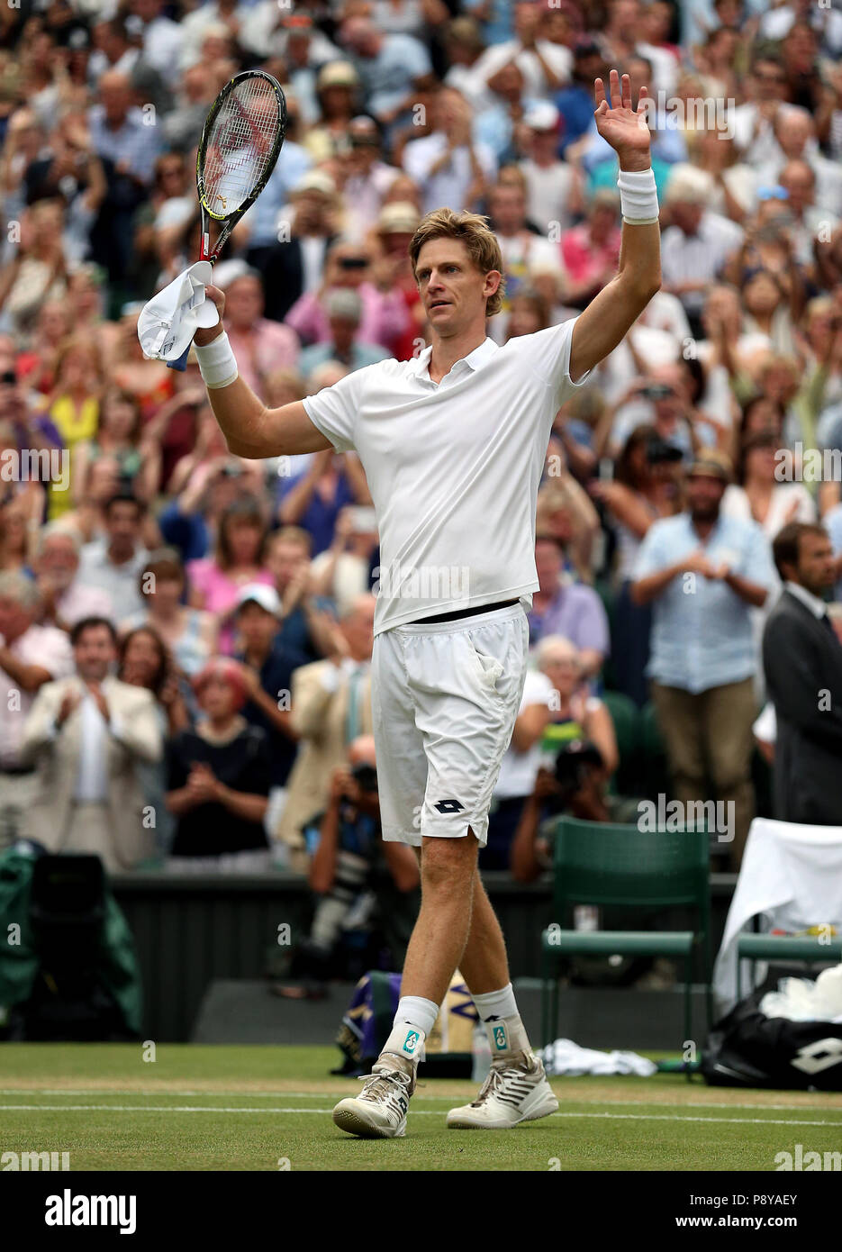 South African eighth seed Kevin Anderson celebrates having reached his first Wimbledon final, beating American ninth seed John Isner 7-6 (8/6) 6-7 (5/7) 6-7 (9/11) 6-4 26-24 in the longest semi-final in the tournament’s history on day eleven of the Wimbledon Championships at the All England Lawn Tennis and Croquet Club, Wimbledon. Stock Photo