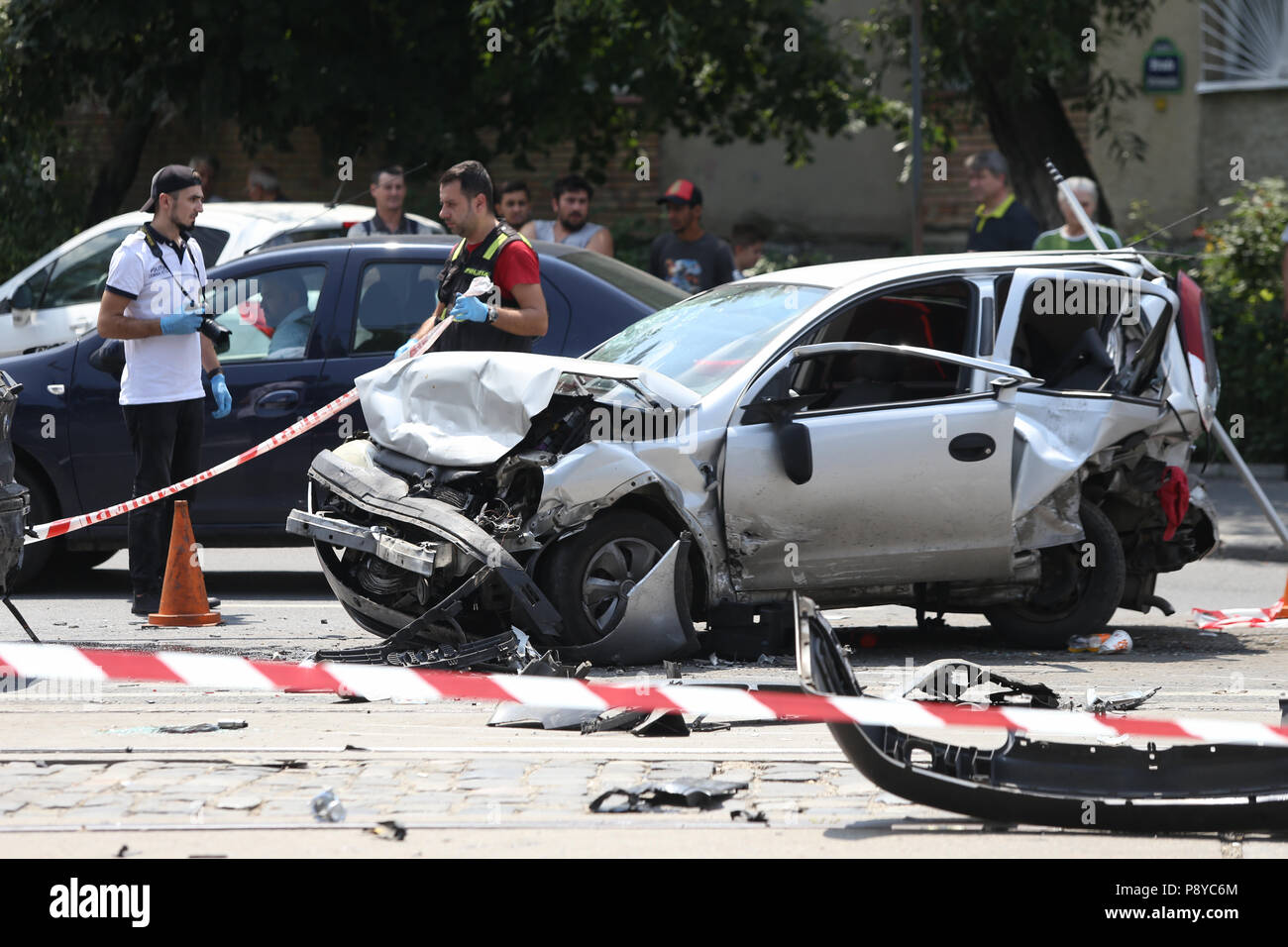 BUCHAREST, ROMANIA - JULY 13: Several vehicles are damaged on the road after a collective car accident, on July 13 Stock Photo
