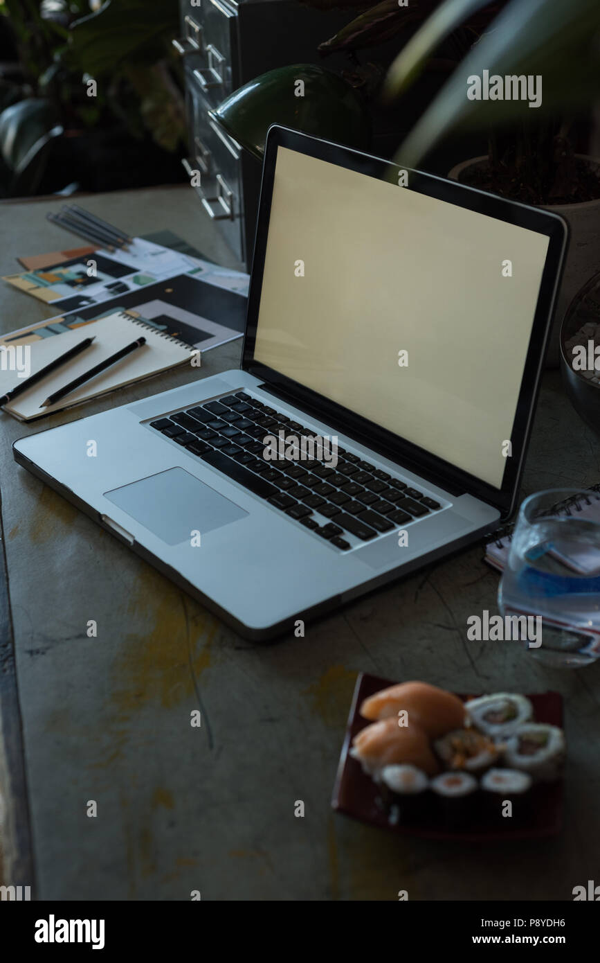 Laptop on a desk at home Stock Photo