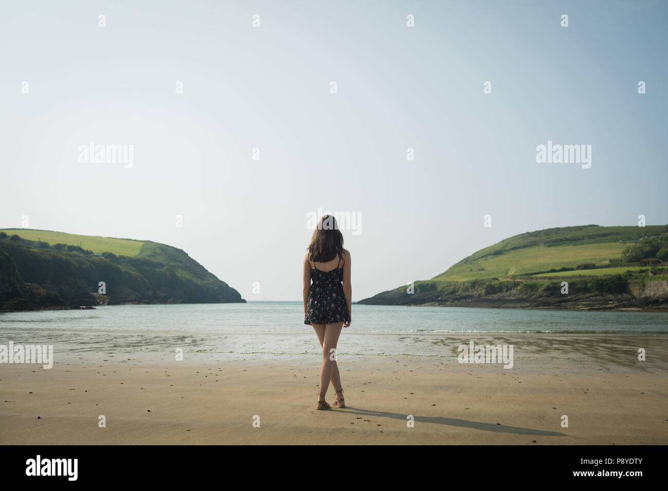 Legs crossed standing hires stock photography and images Alamy