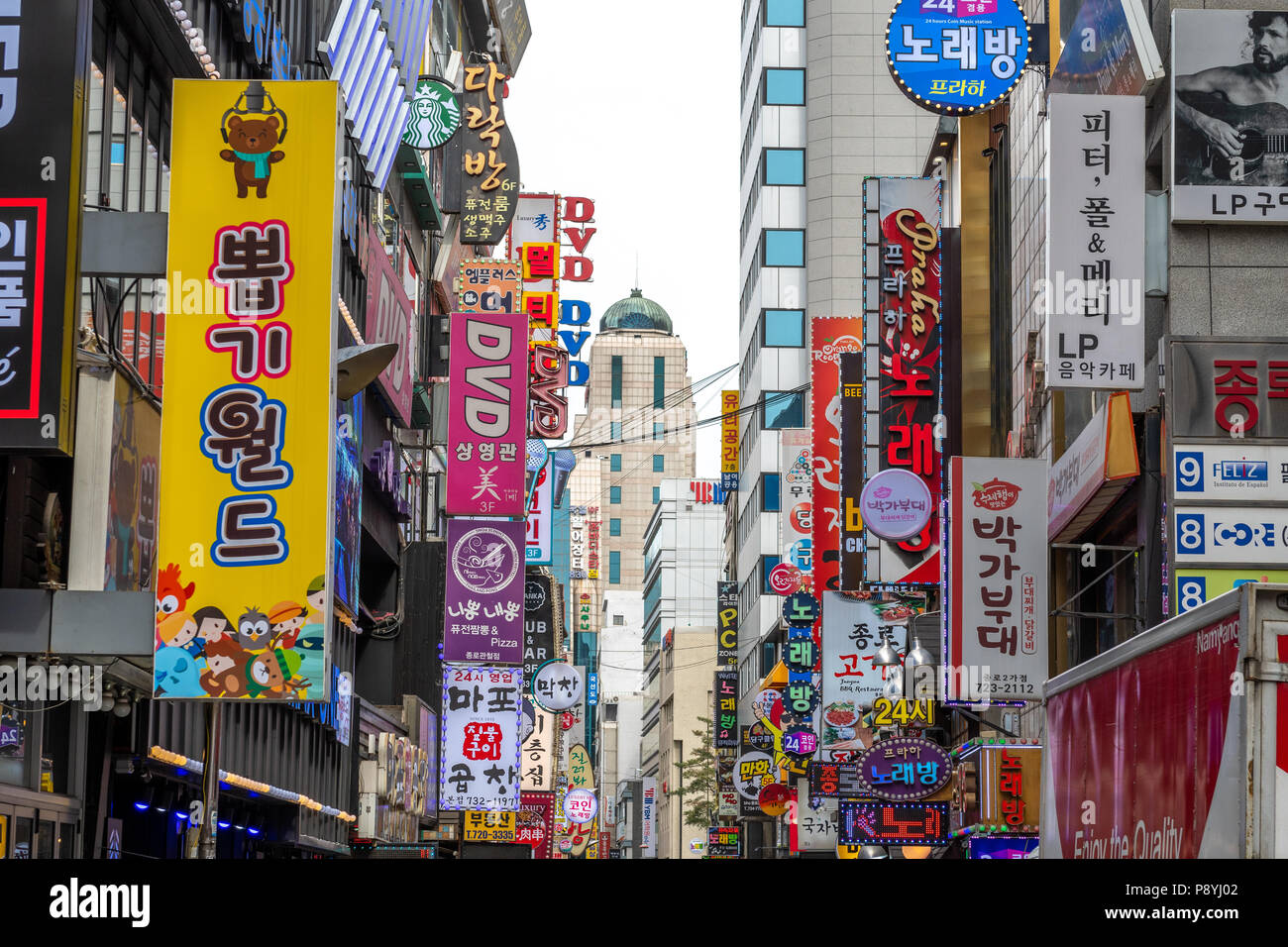 Signs above shops in Myeong-Dong, Seoul, South Korea Stock Photo