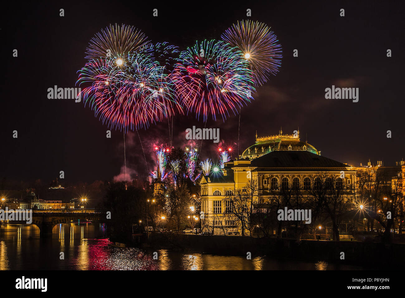 New Year Prague fireworks 2018 over river Vltava, National Theater and historic architecture. Stock Photo