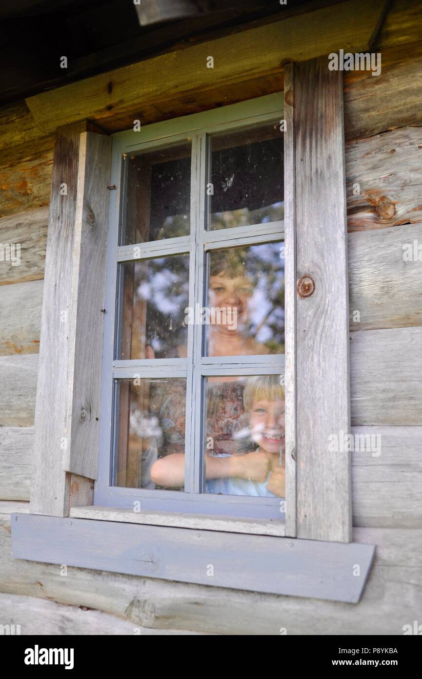 Log cabin replica at the site of Laura Ingalls Wilder's birthplace, setting for book 'Little House in the Big Woods', Pepin, Wisconsin, USA Stock Photo