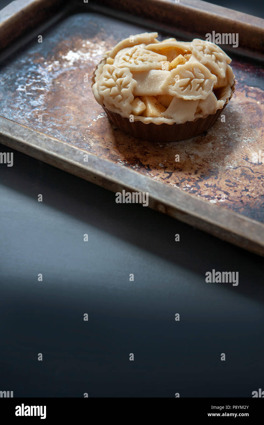 Mini Apple Pie on Baking Sheet Stock Photo