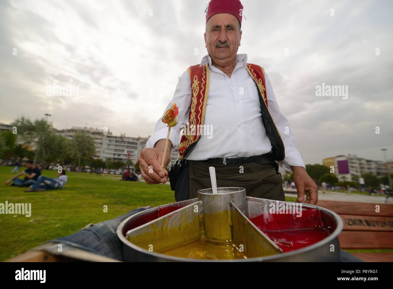 Traditional Ottoman man selling street food, candy selling man Stock Photo