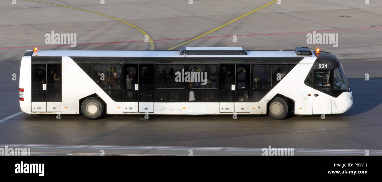 Berlin, Germany, airport bus brings passengers to the terminal of Berlin Tegel Airport Stock Photo