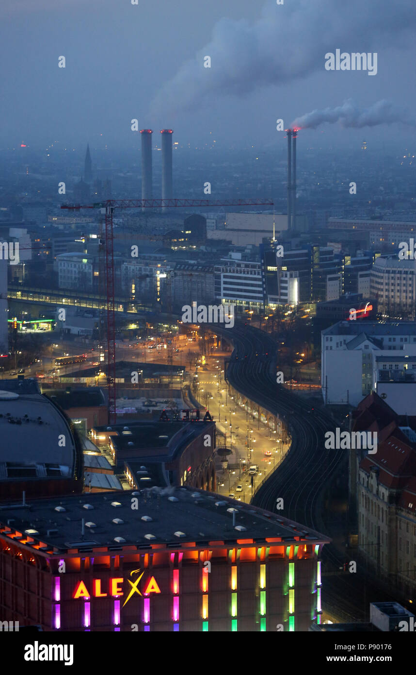Berlin, Germany, Smoking chimneys of the cogeneration plant Berlin-Mitte at night Stock Photo