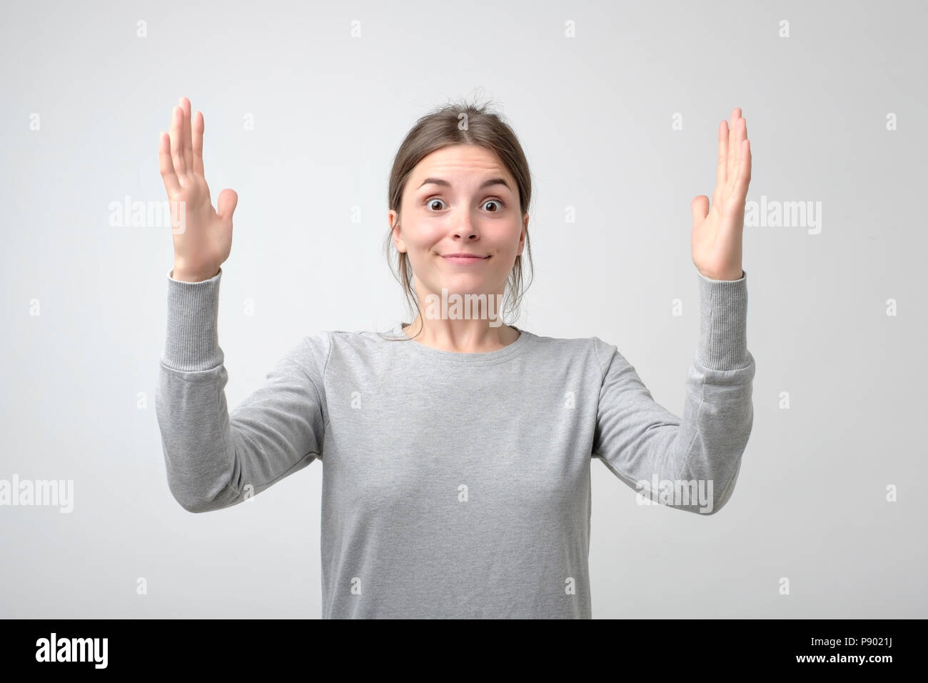 Hands show size hi-res stock photography and images - Alamy