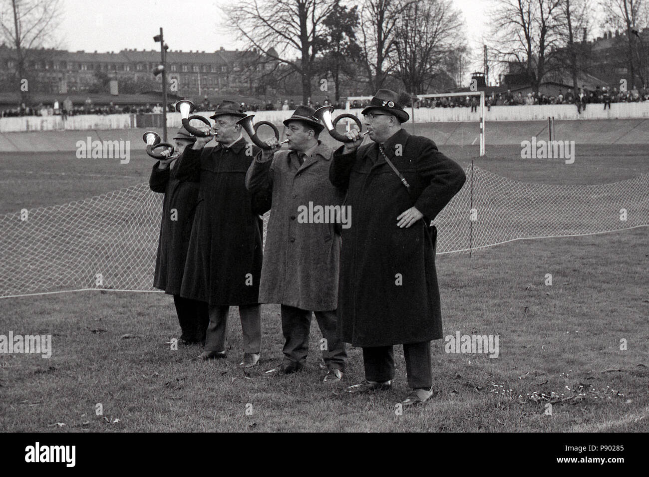 Dresden, GDR, Jagdhornblaeser at the greyhound race on the former cycle track Johannstadt Stock Photo