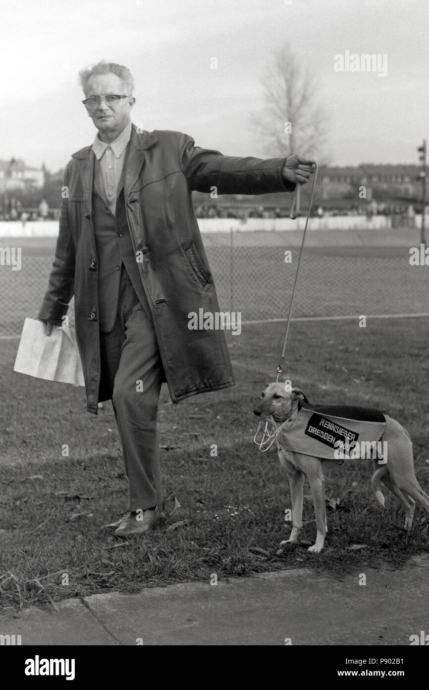 Dresden, GDR, owner of a greyhound, winner of a Greyhound race on the former cycle track Johannstadt Stock Photo