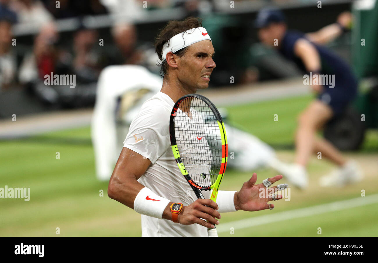 Rafael Nadal reacts on day eleven of the Wimbledon Championships at the All England Lawn Tennis and Croquet Club, Wimbledon. PRESS ASSOCIATION Photo. Picture date: Friday July 13, 2018. See PA story TENNIS Wimbledon. Photo credit should read: Jonathan Brady/PA Wire. Stock Photo