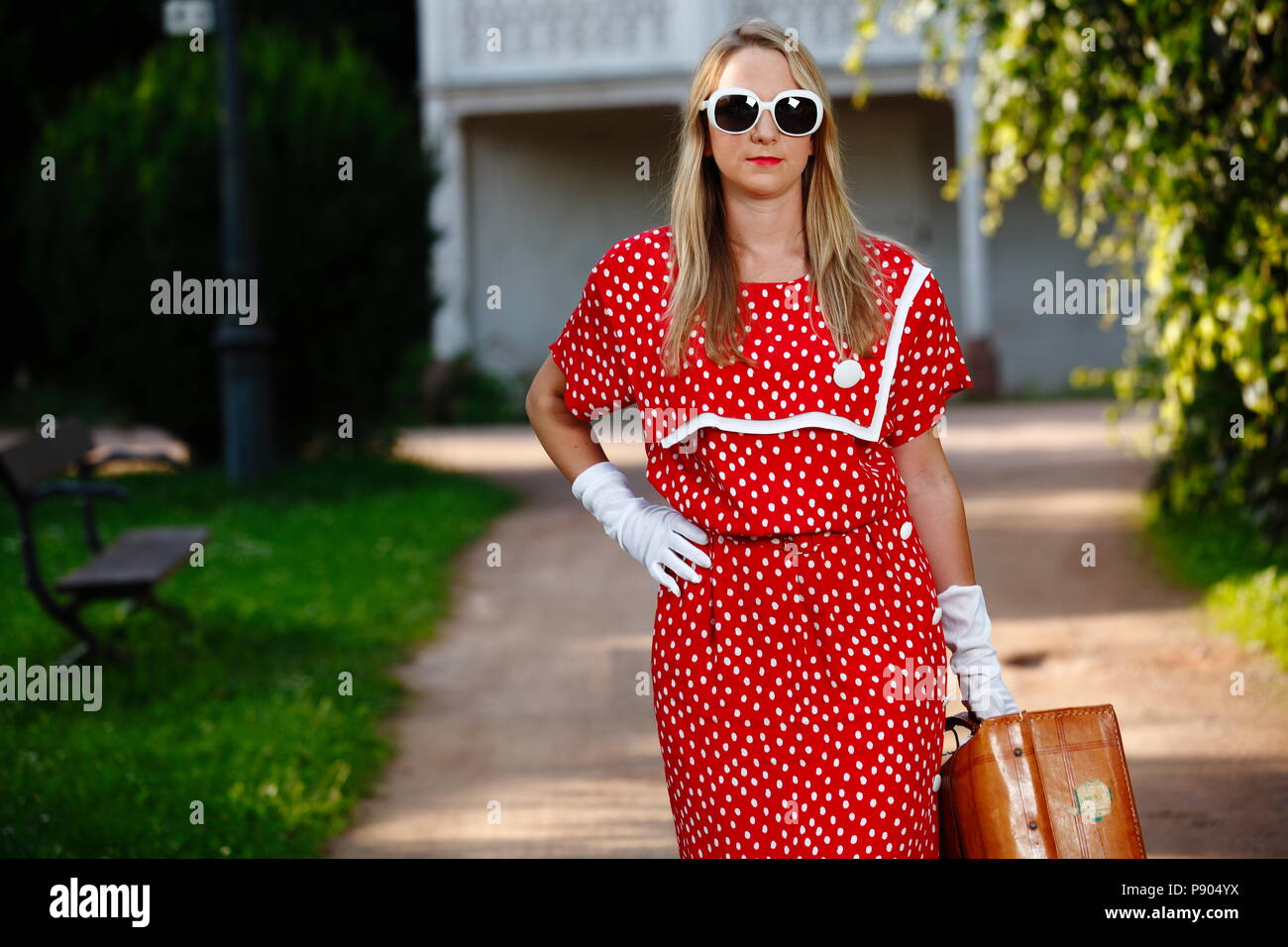Retro vintage 60's 70's 80's young blonde girl in red dress old Stock Photo  - Alamy