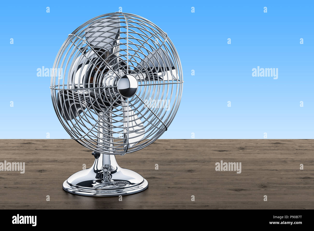 Retro Table Fan on the wooden desk, 3D rendering Stock Photo