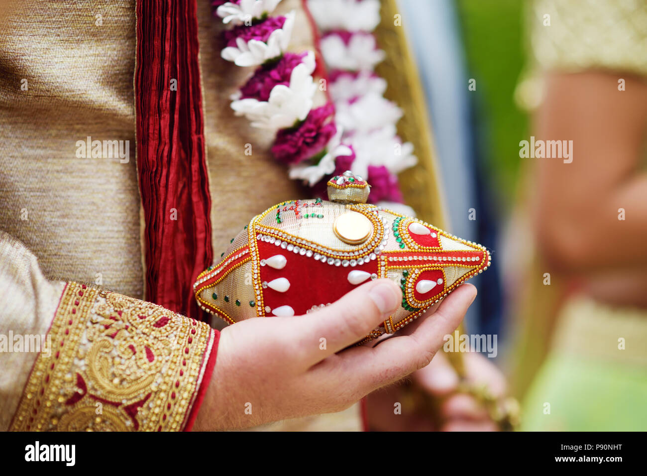 Amazing hindu wedding ceremony. Details of traditional indian wedding. Beautifully decorated hindu wedding accessories. Indian marriage traditions. Stock Photo
