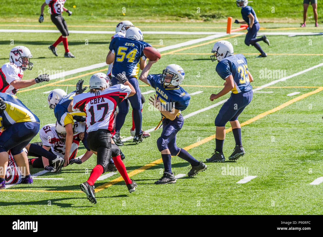 Dramatic, colorful action photo's of Boys Bantam football in Calgary