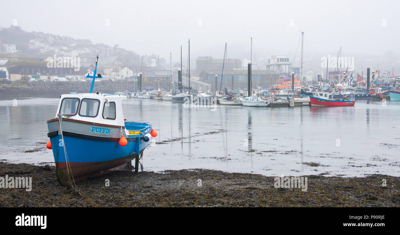 A misty day at Newlyn Harbour in West Cornwall. Stock Photo