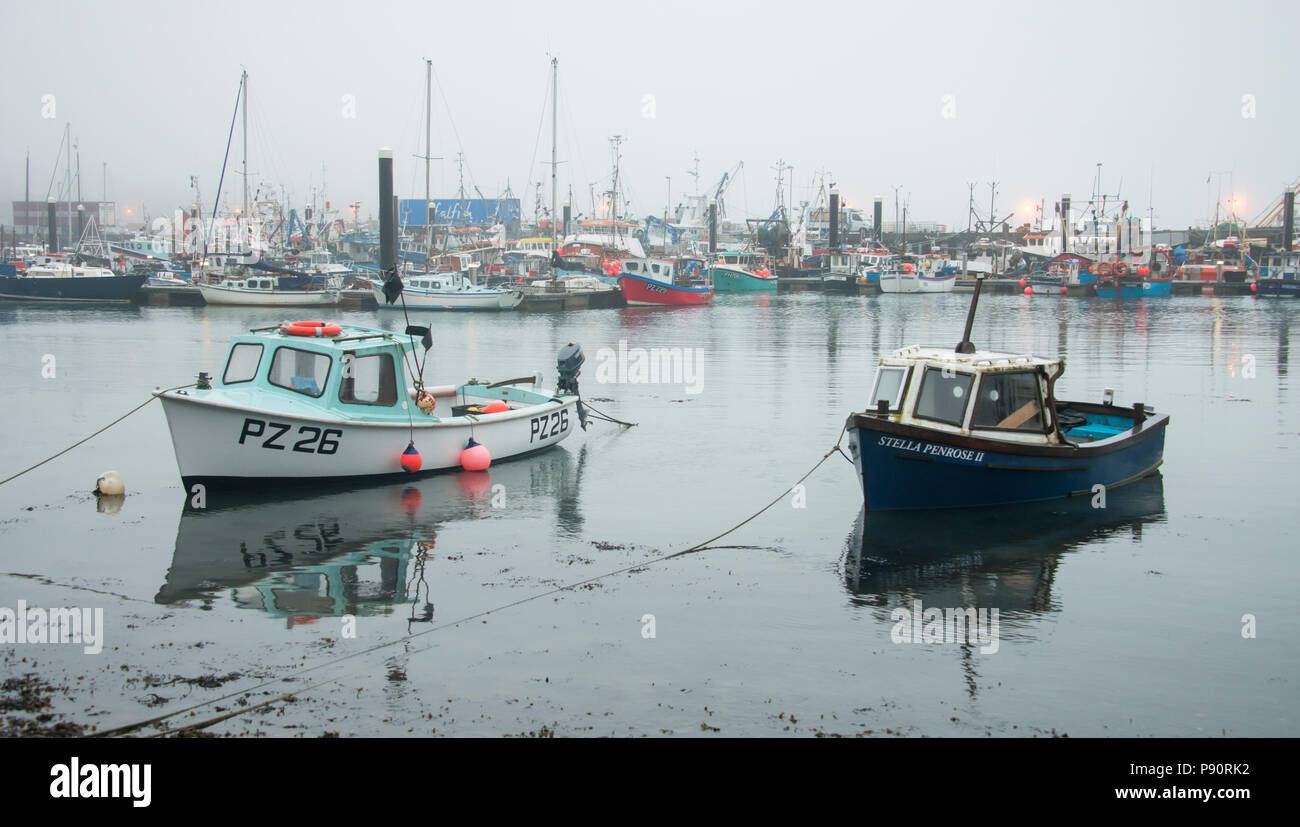 A misty day at Newlyn Harbour in West Cornwall. Stock Photo