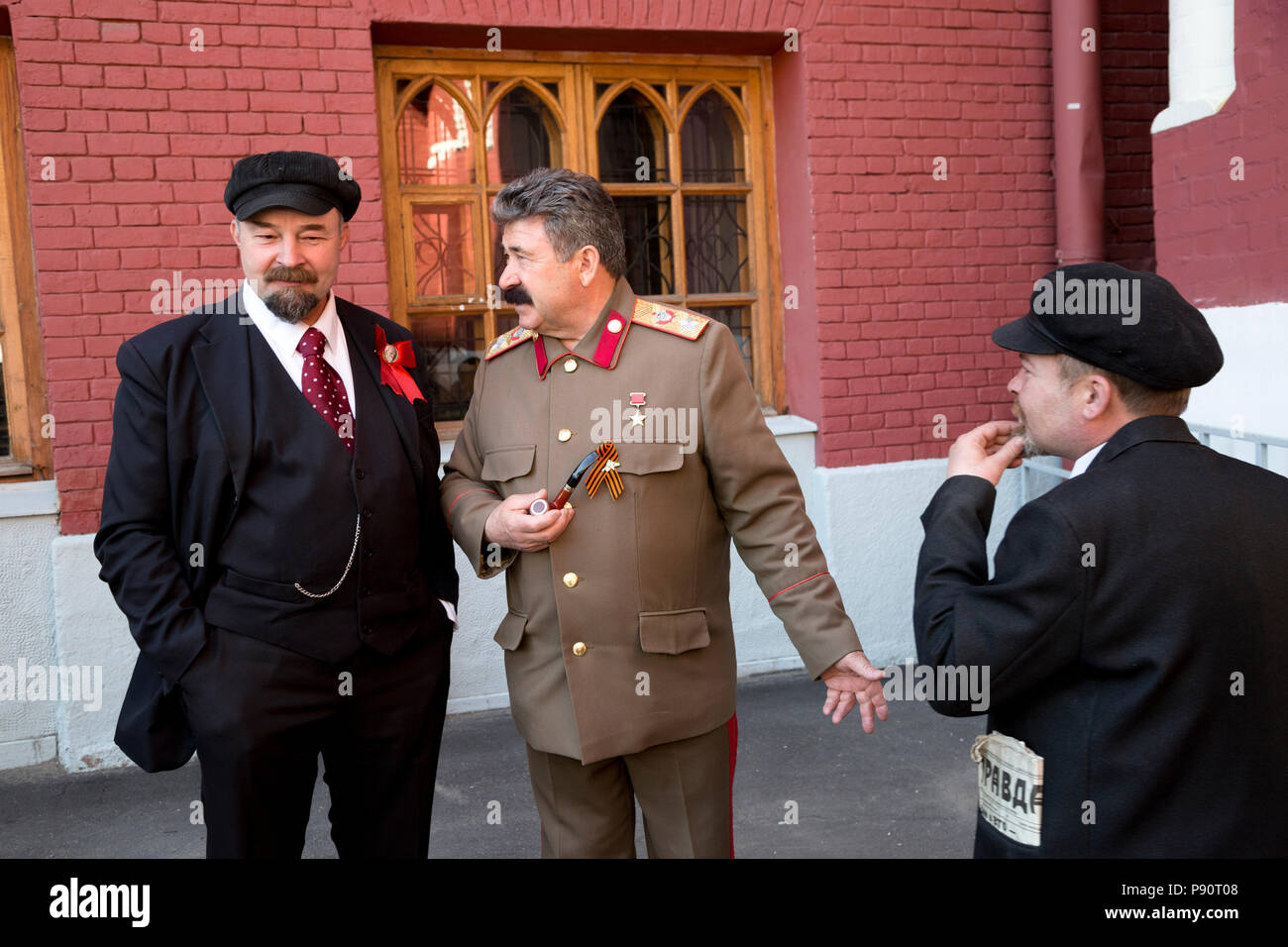 Impersonators of Lenin and Stalin on Red square, which is a very popular tourist place, in the heart of Moscow, Russia Stock Photo