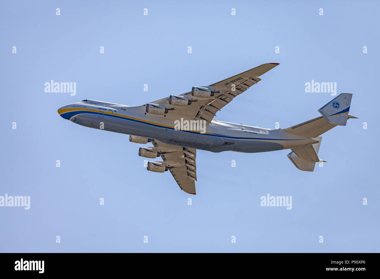 BERLIN / GERMANY - APRIL 29, 2018: Transport plane, Antonov 225 Mriya flies in the sky. The Antonov An-225 Mriya is a strategic airlift cargo aircraft Stock Photo