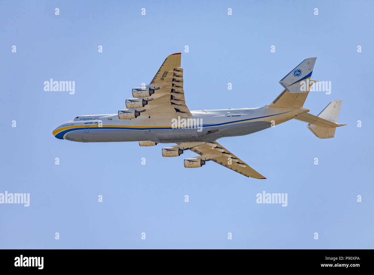 BERLIN / GERMANY - APRIL 29, 2018: Transport plane, Antonov 225 Mriya flies in the sky. The Antonov An-225 Mriya is a strategic airlift cargo aircraft Stock Photo