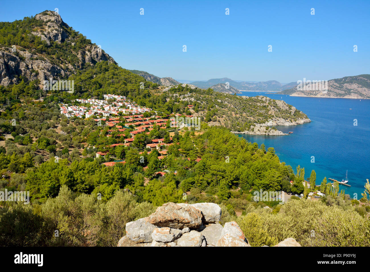 View over cottage village near Turunc suburb of Marmaris resort town in Turkey. Stock Photo