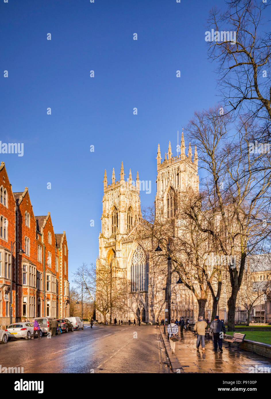 The West facade of York Minster, seen in winter from Duncombe Place after a shower. Stock Photo