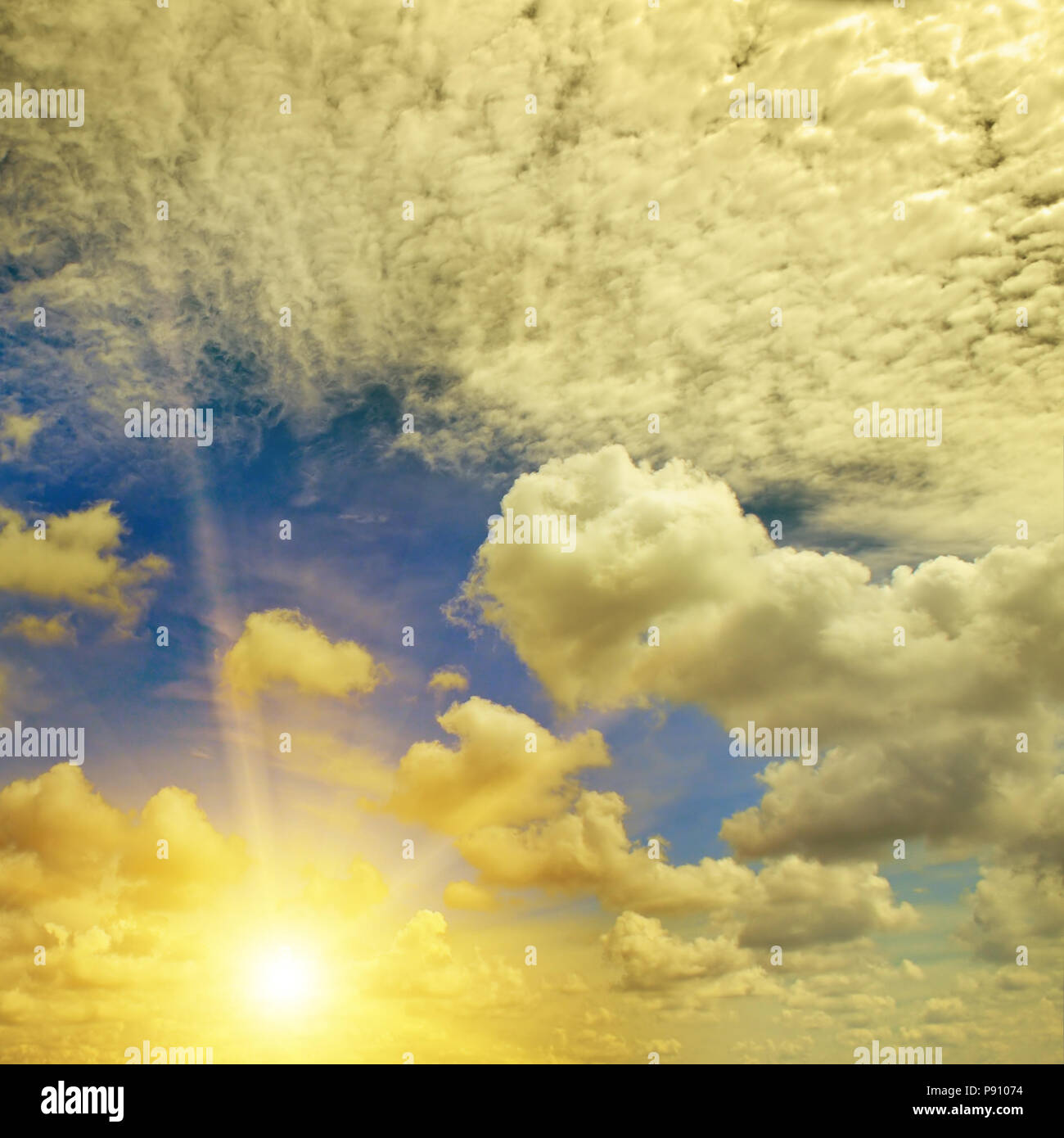 Sunset over the horizon. Sky with colored clouds Stock Photo - Alamy