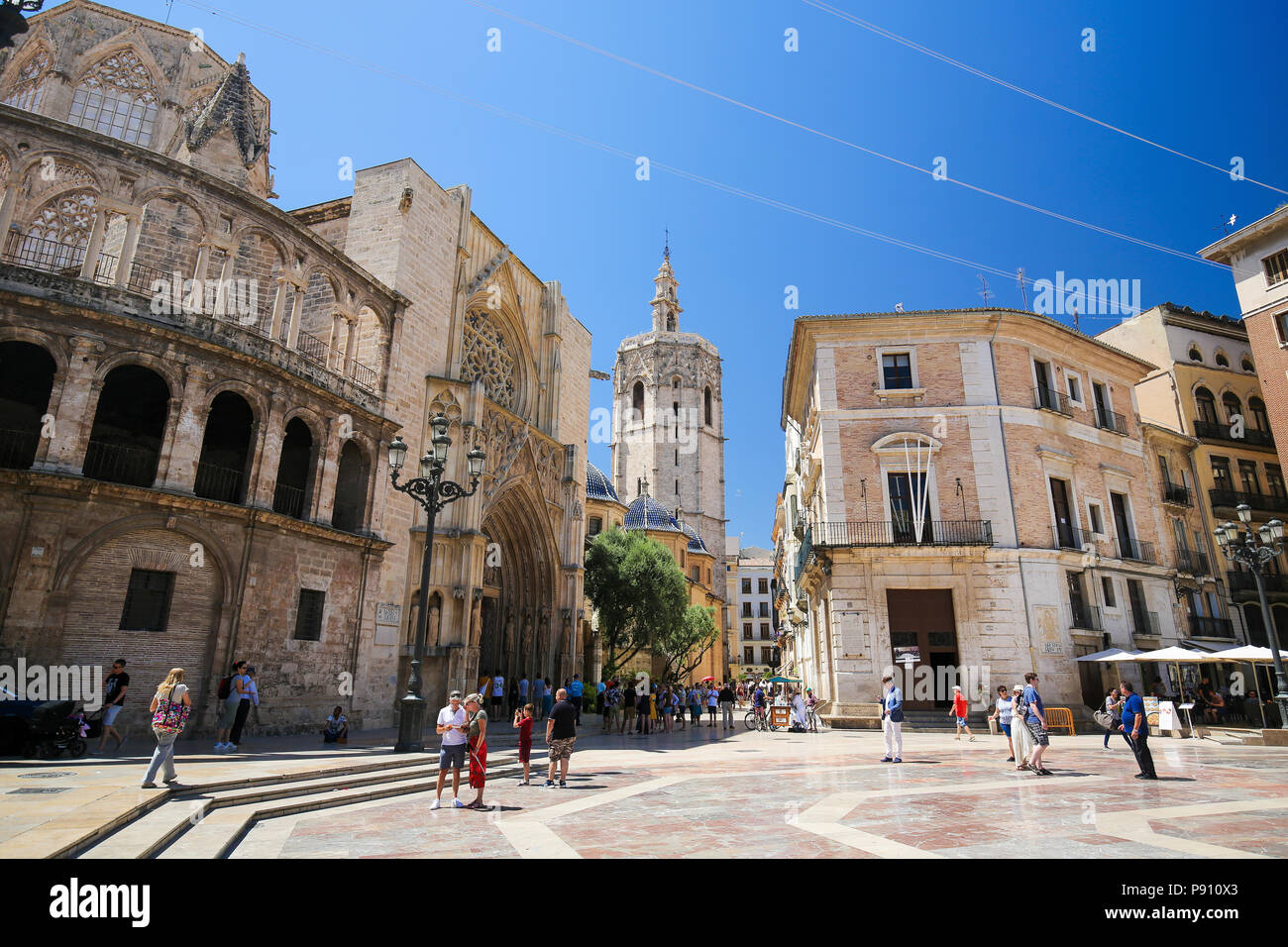 Valencia Cathedral (13th Century) and the Torre Del Micalet at the Plaza de la Almoina in the center of Valencia, Spain Stock Photo