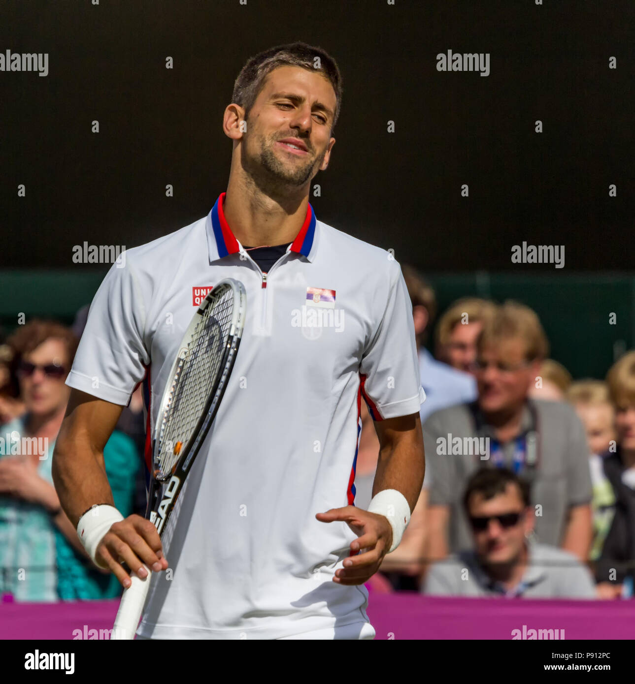 Tennis Player Novak Djokovic playing at the 2012 London Olympics at Wimbledon, London, UK on 30 July 2012 Stock Photo