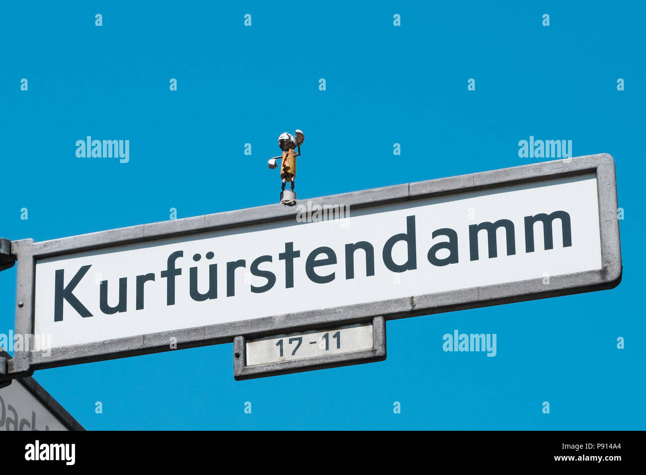 Berlin, Germany - july 2017: Street name sign of the famous shopping street Kurfuerstendamm (/Kudamm) in Berlin, Germany Stock Photo