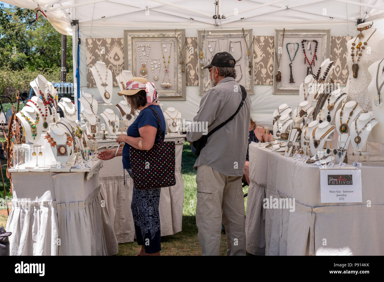 Patrons visit artist booths during annual small town art fair; Salida; Colorado; USA Stock Photo