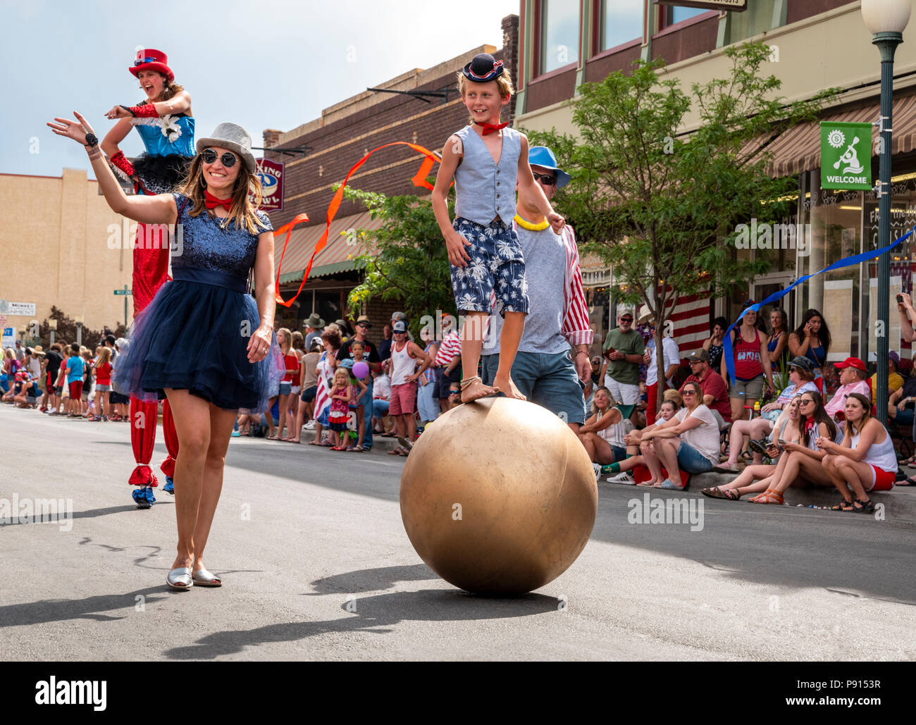 Salida Circus characters march in annual Fourth of July Parade in the small mountain town of Salida; Colorado; USA Stock Photo