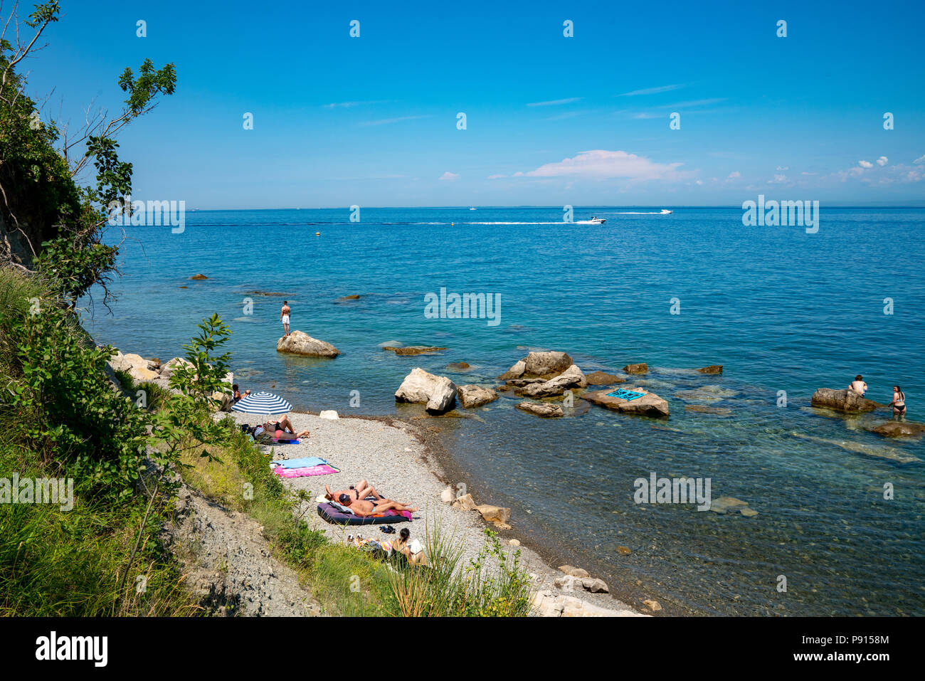 Strunjan, Slovenia, 14 July 2018.  Beach at the Adriatic Sea in the Strunjan Natural Reserve, which is the longest section of unspoilt coastline in th Stock Photo