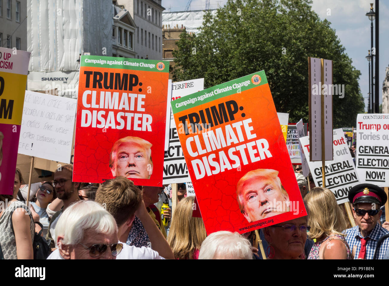London, England, UK. 13 July, 2018.  Anti Trump climate change protestors in London marching against Donald Trump's visit to the UK © Benjamin John/ Alamy Live News. Stock Photo