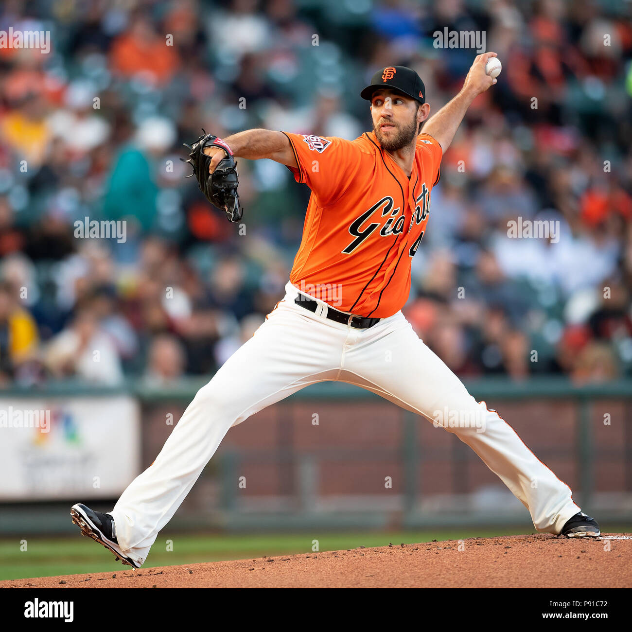 San Francisco, California, USA. 13th July, 2018. San Francisco Giants starting pitcher Madison Bumgarner (40) delivers from the mound in the kickoff inning to the ''Battle of the Bay'' series, during a MLB game between the Oakland Athletics and the San Francisco Giants at AT&T Park in San Francisco, California. Valerie Shoaps/CSM/Alamy Live News Stock Photo