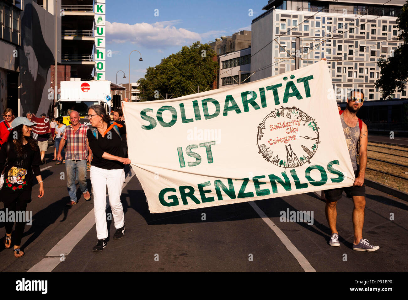 Cologne, Germany, 13 July 2018. Several thousand people demonstrate on July 13, 2018 in Cologne for the rescue of refugees from the Mediterranean Sea. Under the motto 'Stop dying in the Mediterranean', a coalition of initiatives, political groups and private individuals wants to send a signal for humanity. Cologne, Germany.   Credit: Joern Sackermann/Alamy Live News Stock Photo