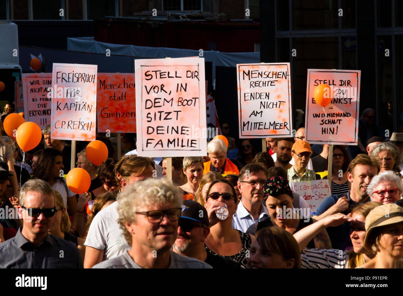 Cologne, Germany, 13 July 2018. Several thousand people demonstrate on July 13, 2018 in Cologne for the rescue of refugees from the Mediterranean Sea. Under the motto 'Stop dying in the Mediterranean', a coalition of initiatives, political groups and private individuals wants to send a signal for humanity. Cologne, Germany.   Credit: Joern Sackermann/Alamy Live News Stock Photo