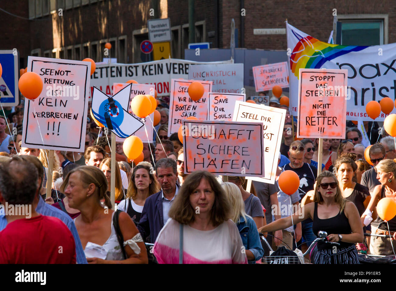 Cologne, Germany, 13 July 2018. Several thousand people demonstrate on July 13, 2018 in Cologne for the rescue of refugees from the Mediterranean Sea. Under the motto 'Stop dying in the Mediterranean', a coalition of initiatives, political groups and private individuals wants to send a signal for humanity. Cologne, Germany.   Credit: Joern Sackermann/Alamy Live News Stock Photo