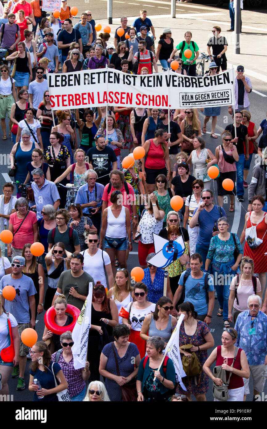 Cologne, Germany, 13 July 2018. Several thousand people demonstrate on July 13, 2018 in Cologne for the rescue of refugees from the Mediterranean Sea. Under the motto 'Stop dying in the Mediterranean', a coalition of initiatives, political groups and private individuals wants to send a signal for humanity. Cologne, Germany.   Credit: Joern Sackermann/Alamy Live News Stock Photo