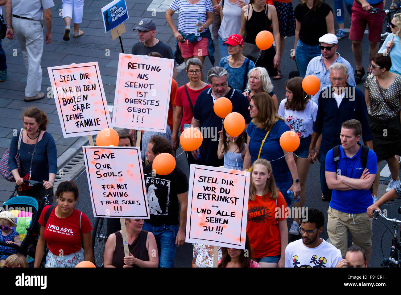 Cologne, Germany, 13 July 2018. Several thousand people demonstrate on July 13, 2018 in Cologne for the rescue of refugees from the Mediterranean Sea. Under the motto 'Stop dying in the Mediterranean', a coalition of initiatives, political groups and private individuals wants to send a signal for humanity. Cologne, Germany.   Credit: Joern Sackermann/Alamy Live News Stock Photo