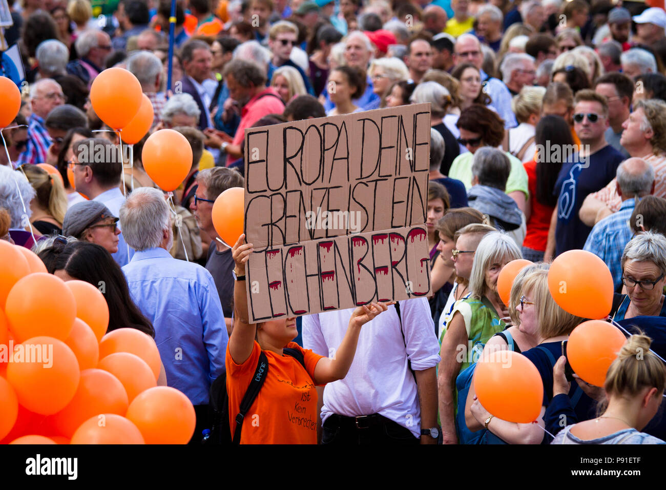 Cologne, Germany, 13 July 2018. Several thousand people demonstrate on July 13, 2018 in Cologne for the rescue of refugees from the Mediterranean Sea. Under the motto 'Stop dying in the Mediterranean', a coalition of initiatives, political groups and private individuals wants to send a signal for humanity. Cologne, Germany.   Credit: Joern Sackermann/Alamy Live News Stock Photo